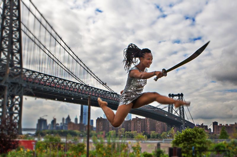 Trampoline Myriam Gadri with Sword jumping by the Williamsburg Bridge