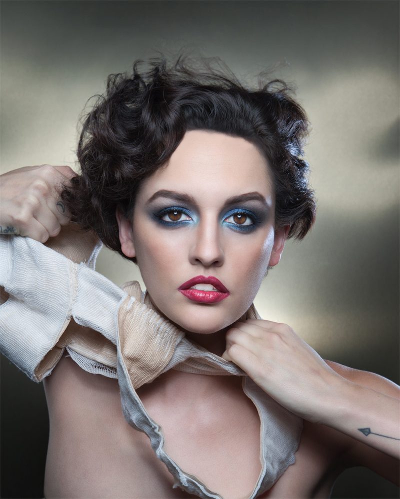 Conceptual-Beauty-Woman-bandages-headphones